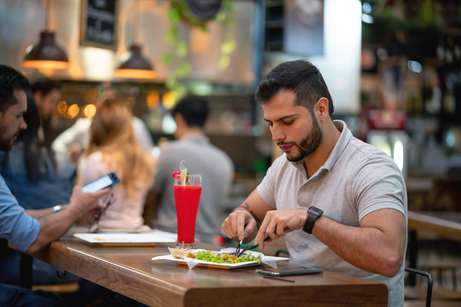 Man eating at the food court